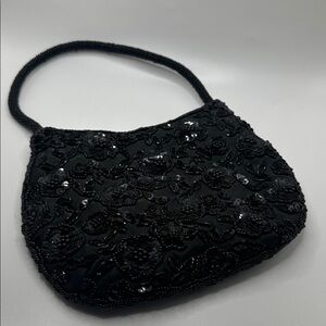 Hillard & Hanson Beaded purse, black, 8” by 7”.